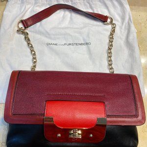 DVF authentic small envelope clutch. Red & Black leather. Gold clasp&chain strap